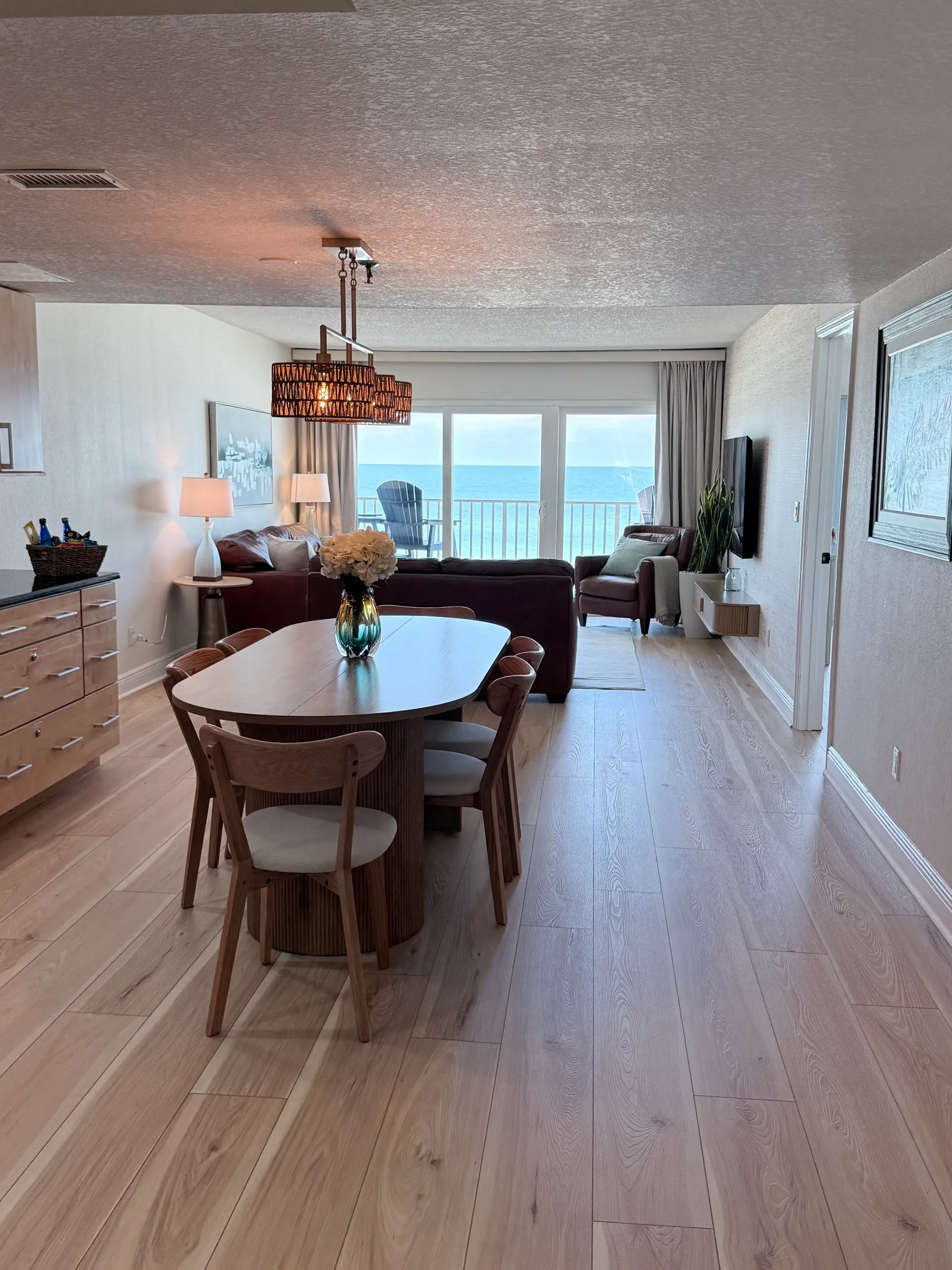Bright coastal condo interior with an ocean view